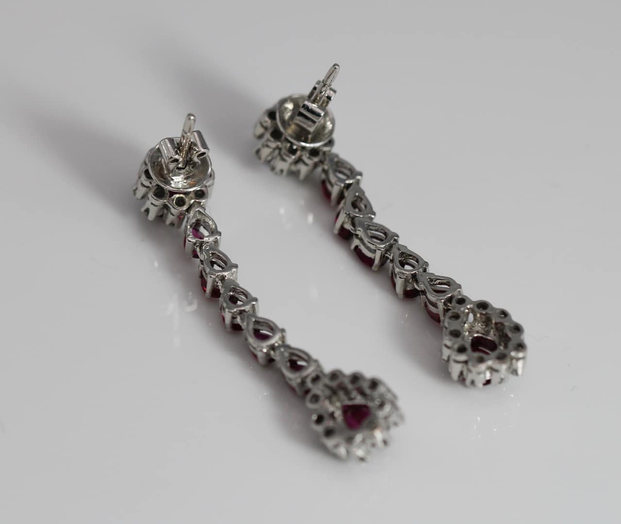 71.1g 14KWG 3.70ctw PEAR SHAPED RUBY & 0.36ctw DIAMOND PIERCED DANGLE EARRINGS - Image 2