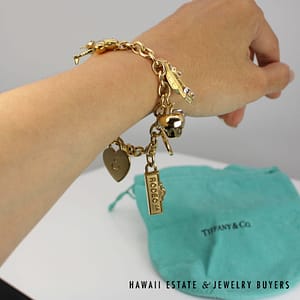 Tiffany & Co. Nine Charm Bracelet 18k Yellow Gold Size 6.75 with Pouch, 76.5g - Image 9