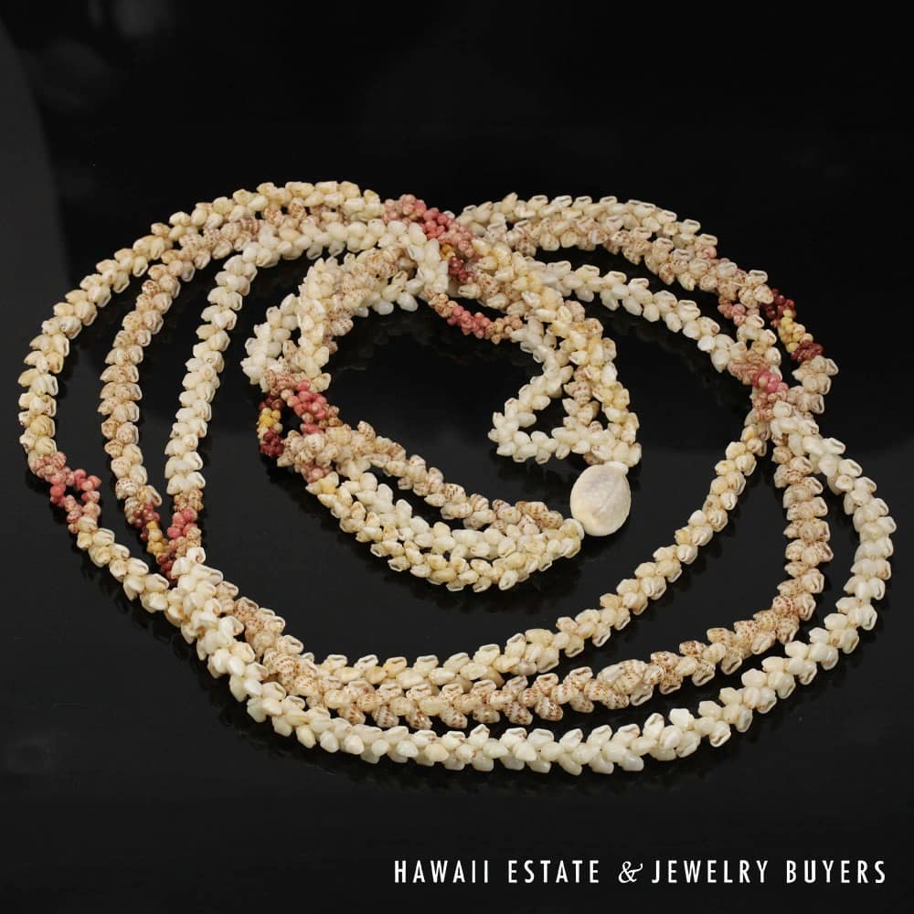Three-Strand Ni'ihau Shell Lei: 38 inch Kipona Pikake Momi.