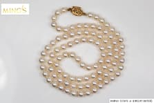MING'S 6-6.5mm CULTURED PEARL STRAND KNOTTED TO 25 INCHES WITH 14KYG CLASP