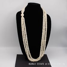 Ni’ihau Shell Lei: Triple Strand White Momi 41 inch Lei